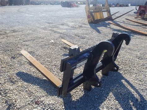 caterpillar skid steer fork oem|cat 420 backhoe attachments forks.